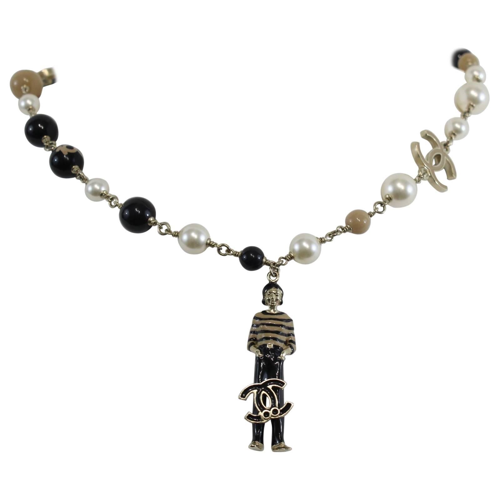 Chanel Fake Pearls and Charms Necklace with Chanel Doll Pendant