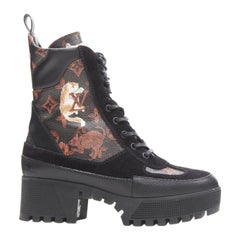 LOUIS VUITTON Catogram bota de combate negra con monograma de gato en ante EU37