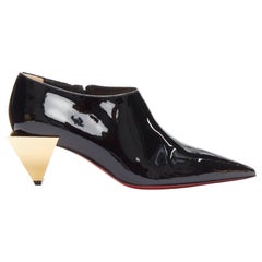 CHRISTIAN LOUBOUTIN Xilobooties 55 gold pyramid heel black patent pump EU38