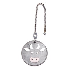 HERMES Cow Charm black leather coin ruthenium bag charm