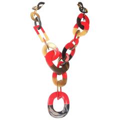 Hermes horn and red lacquer multi coloured linked sautoir necklace