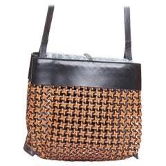 KARA brown woven leather black trimmed tie front crossbody bag