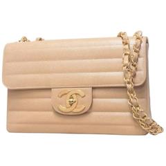 Vintage CHANEL beige 2.55 horizontal stitch large caviar leather shoulder bag.