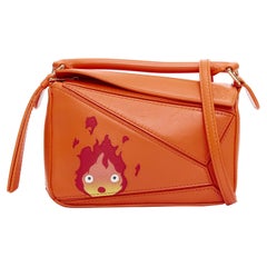 LOEWE Howls Moving Castle Puzzle Calcifer orange mini puzzle bag