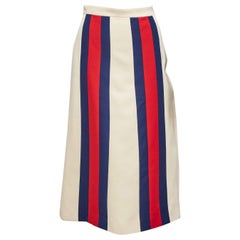 GUCCI jupe midi Aline texturée beige avec bordure en toile bleue et rouge sur le devant