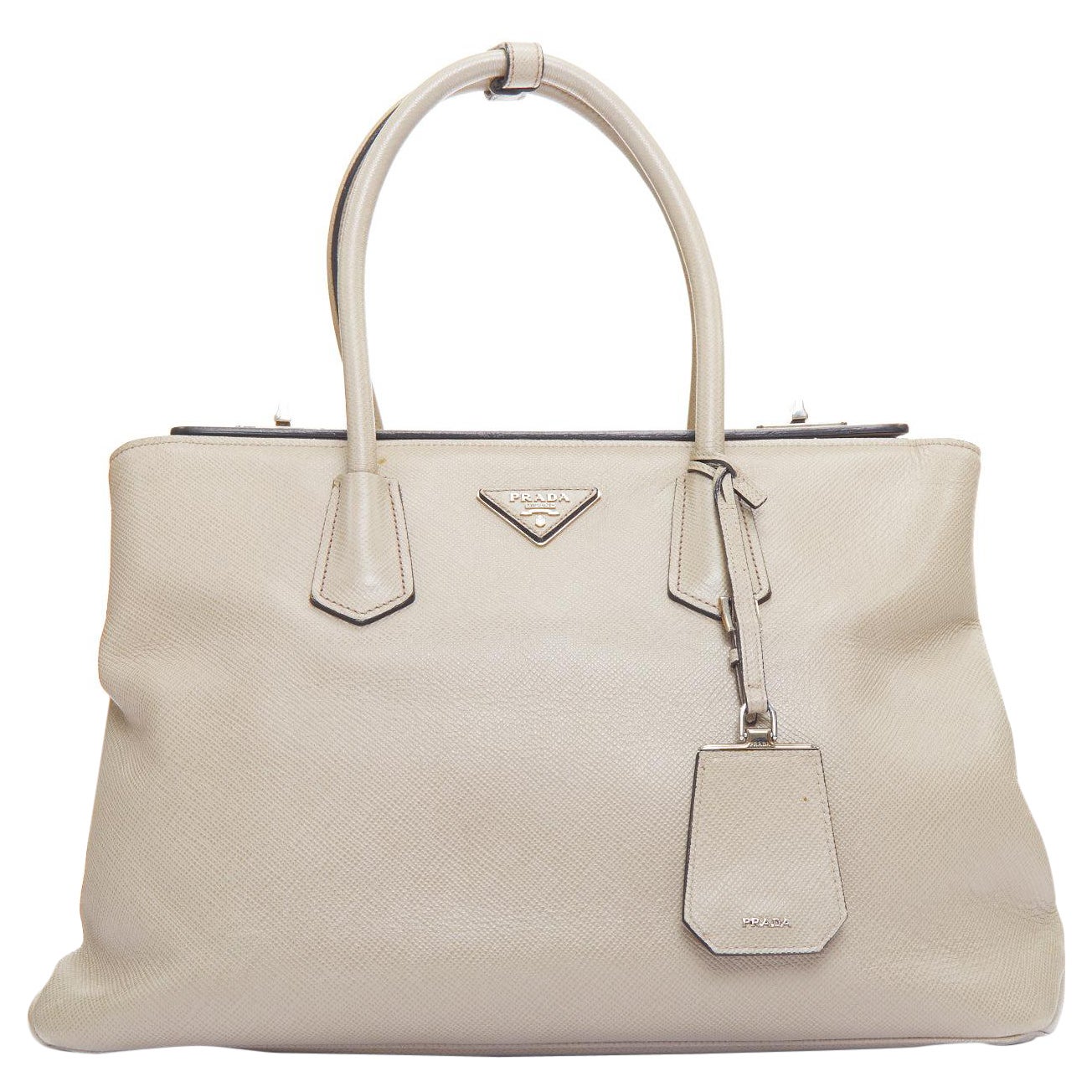 PRADA Borsa Twin beige in pelle saffiano con logo trangle e manico superiore