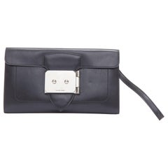 Bolso de mano HERMES Goodlock en caja negra de cuero con herrajes plateados