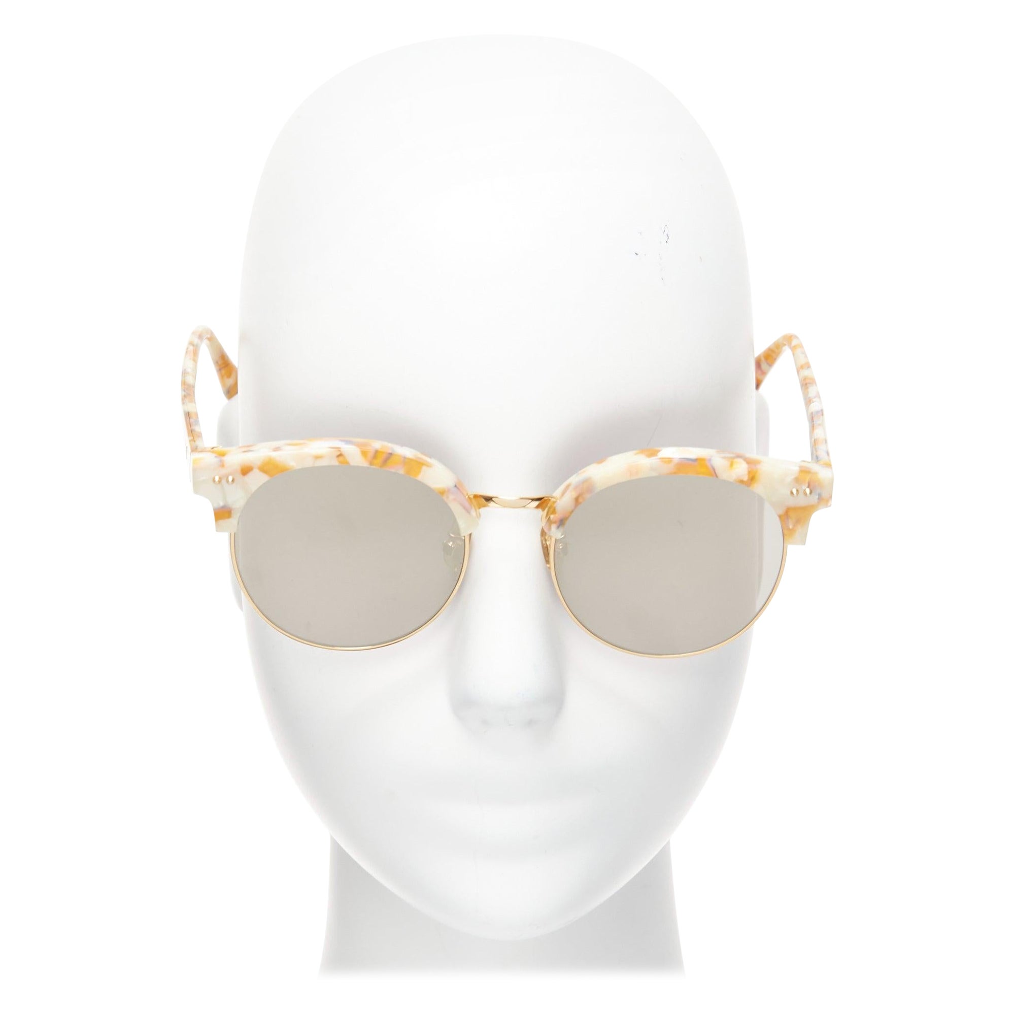 Lunettes de soleil GENTLE MONSTER TOME Supernature gold black cateye reflective purple