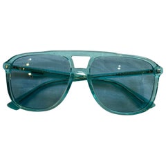Gafas Gucci verdes de plástico semitransparente