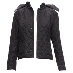 BURBERRY House Check lined black diamond quilted shell hooded jacket