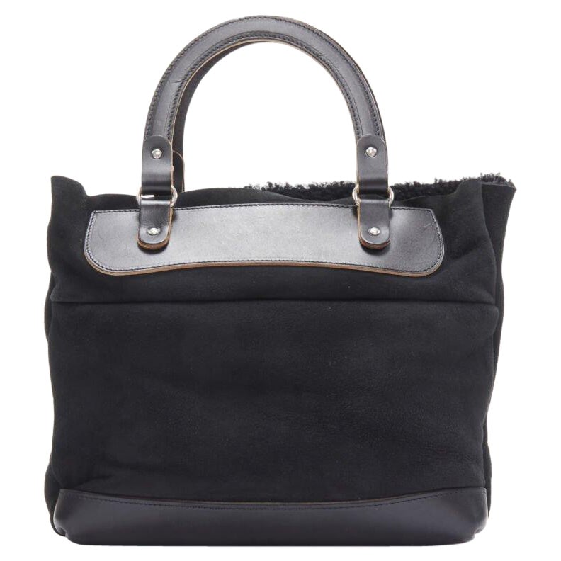 MARNI borsa morbida con manico superiore foderata in shearling nero