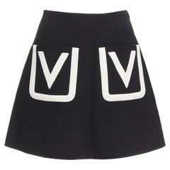 VALENTINO 100% virgin wool black V Logo patch pocket A-line skirt IT38 XS