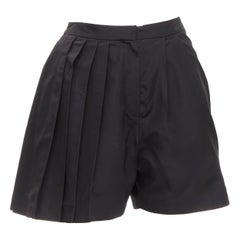 Raf Simons for Christian Dior, pantaloncini svasati asimmetrici in seta nera FR34 XS