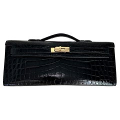 HERMES Kelly Cut "Noir" Black Shiny Niloticus Crocodile Permabrass Hardware