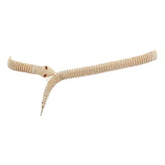 DOLCE GABBANA Collier de ceinture vintage en or et cristal rouge avec chaîne en forme d'œil de serpent et strass