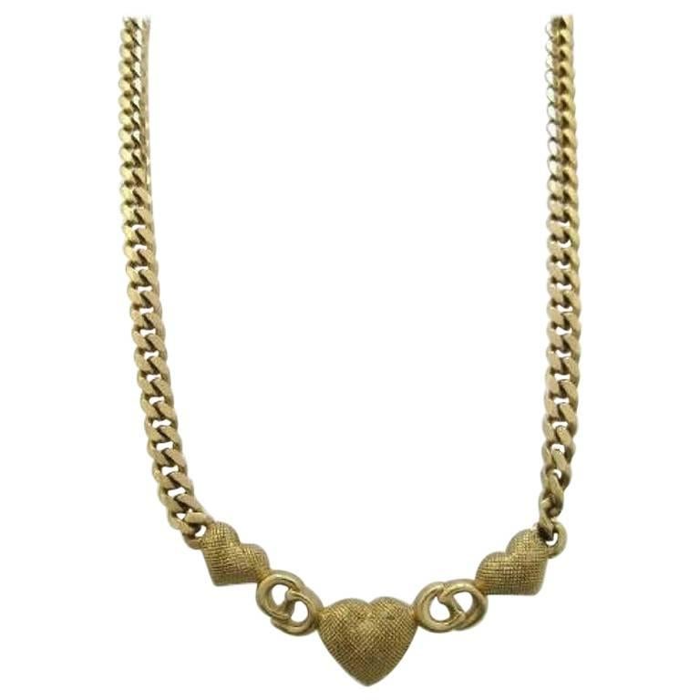 Vintage Christian Dior logo and heart motif, golden chain statement necklace. For Sale