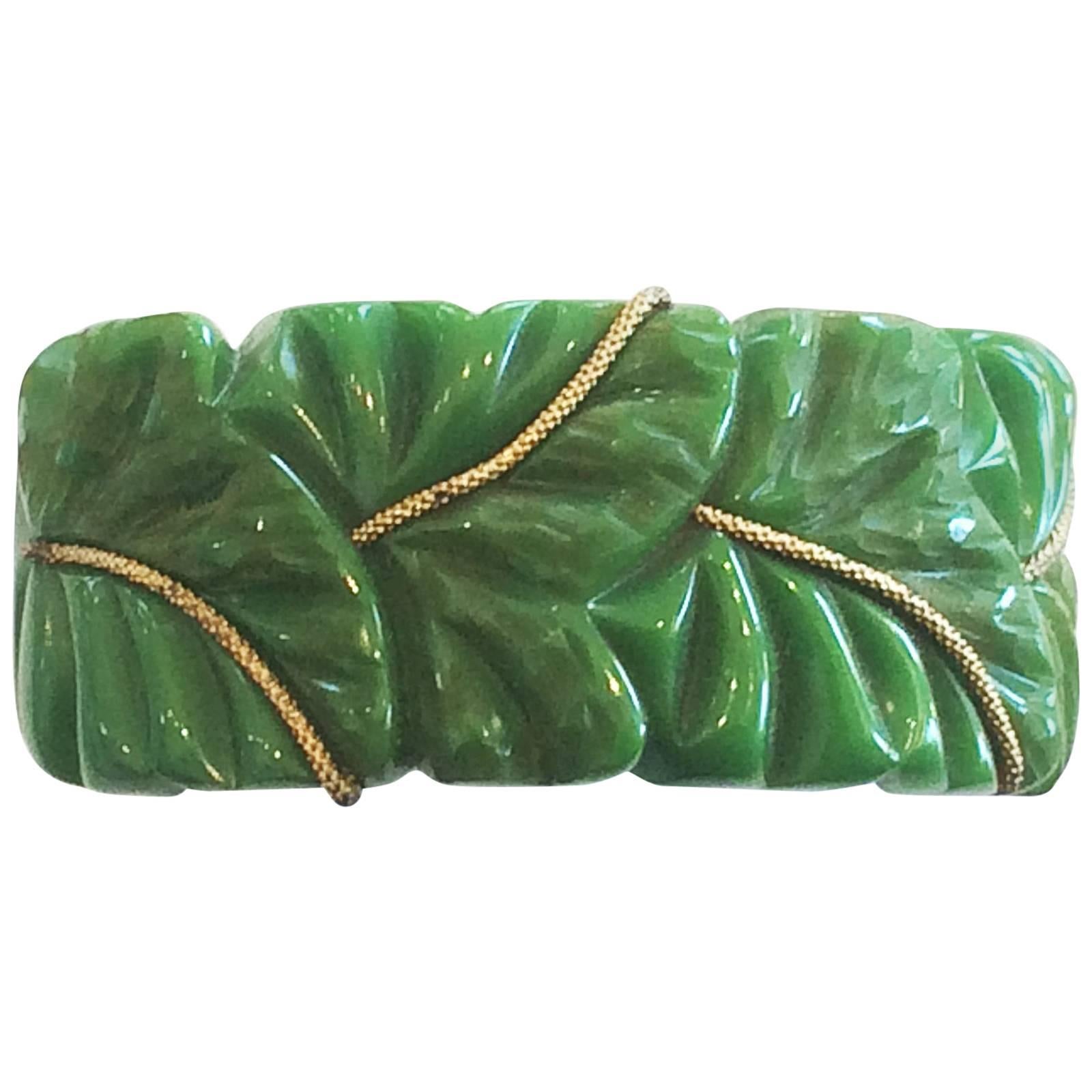 Rare Heavily carved green leaf bakelite hinged bakelite clamper bangle