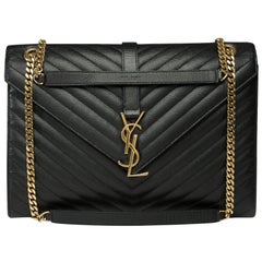 YSL Envelope GM shoulder bag in black chevron grained leather , GHW