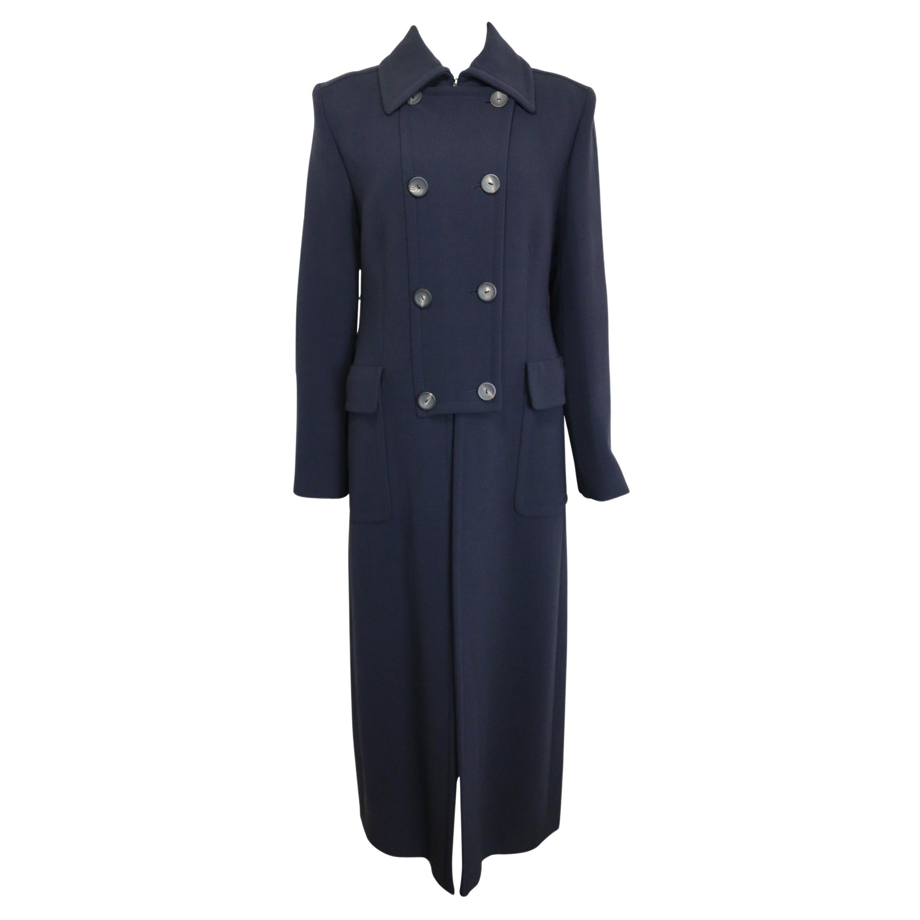 -  Unworn iconic Gucci by Tom Ford Navy Wool Maxi Coat from Fall 1996 collection. 

-Featuring a signature and iconic gold buckle at the back. 

- Featuring epaulettes on the shoulders, a hook fastening on the collar, eight front buttons, zip