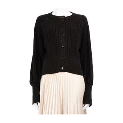 Temperley London Cárdigan negro de punto por cable acanalado Talla L