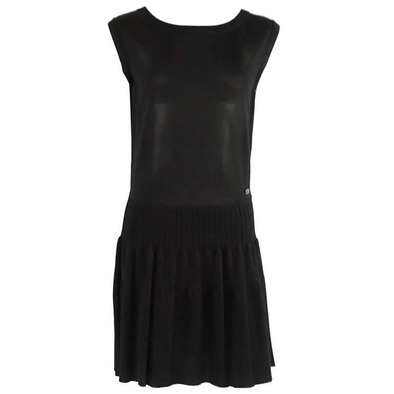 Chanel Black Sleeveless Silk Knit Dress with Pleated Skirt - 38 at 1stDibs
