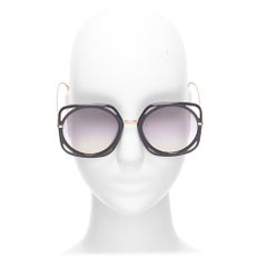 CHRISTIAN DIOR DiorDirection übergroße Sonnenbrille mit schwarzem Rahmen und lila Linsen in Übergröße