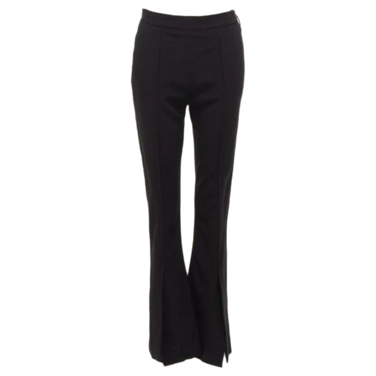 MARNI pantaloni neri con pieghe frontali, orlo a fessura e zip laterale minima IT42 M.