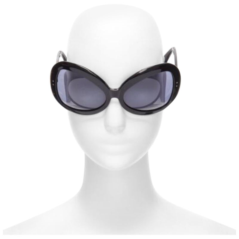 CUTLER AND GROSS M0812 occhiali da sole a farfalla con lenti nere e grigie