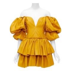 AJE 2019 Castellain mini vestido de cuero amarillo mostaza con mangas abullonadas UK6 XS