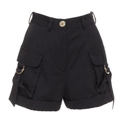BALMAIN black wool gold logo button pocketed cargo shorts FR36 S