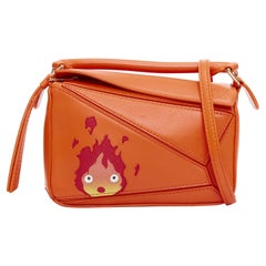LOEWE Howls Moving Castle Puzzle Calcifer orange mini puzzle bag