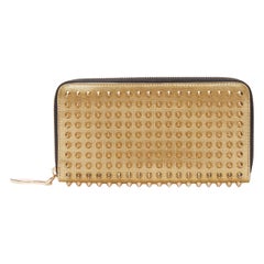 CHRISTIAN LOUBOUTIN Panettone gold studded leather zip around long wallet