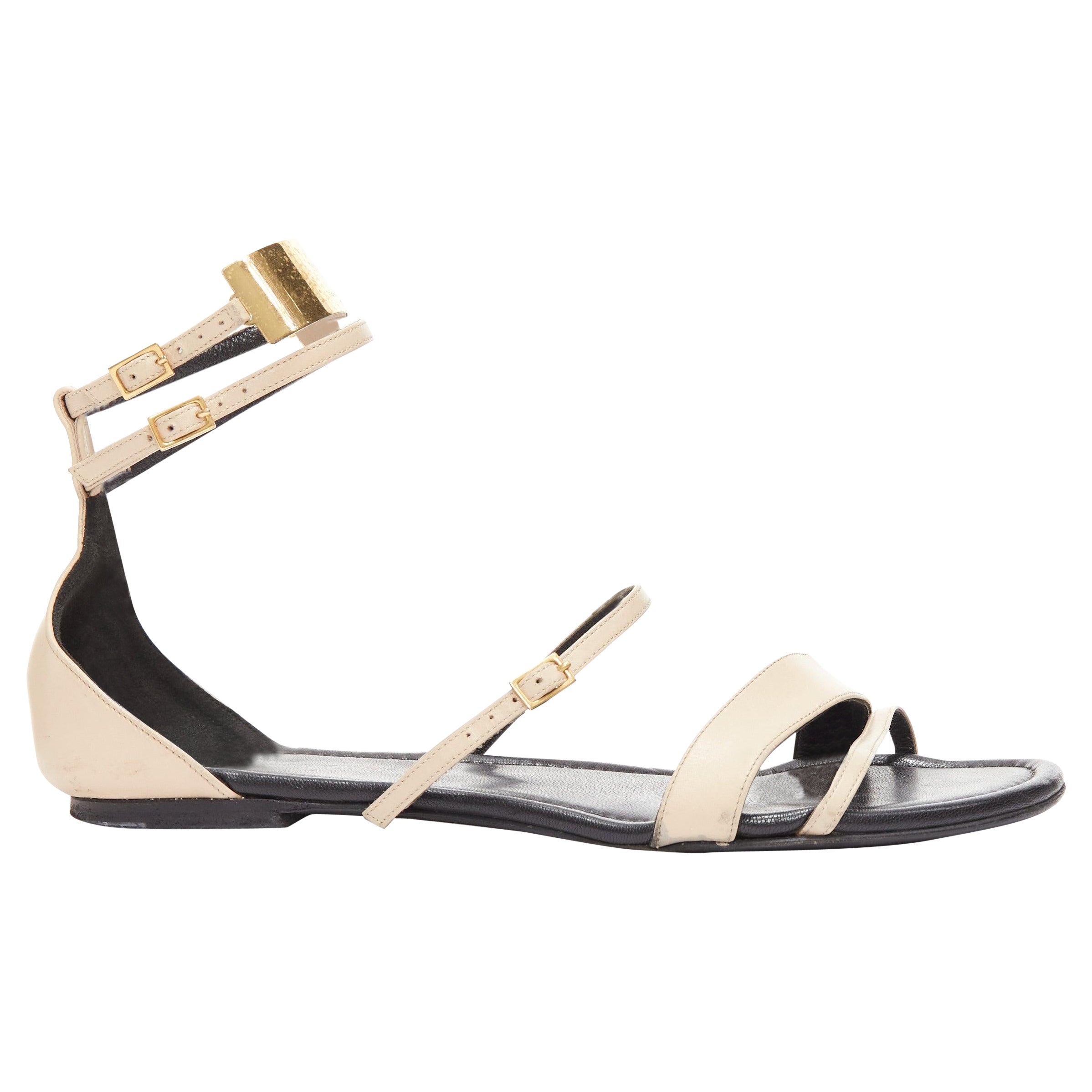 SAINT LAURENT Janis nude leather gold metal bar flat sandals EU38.5 For Sale