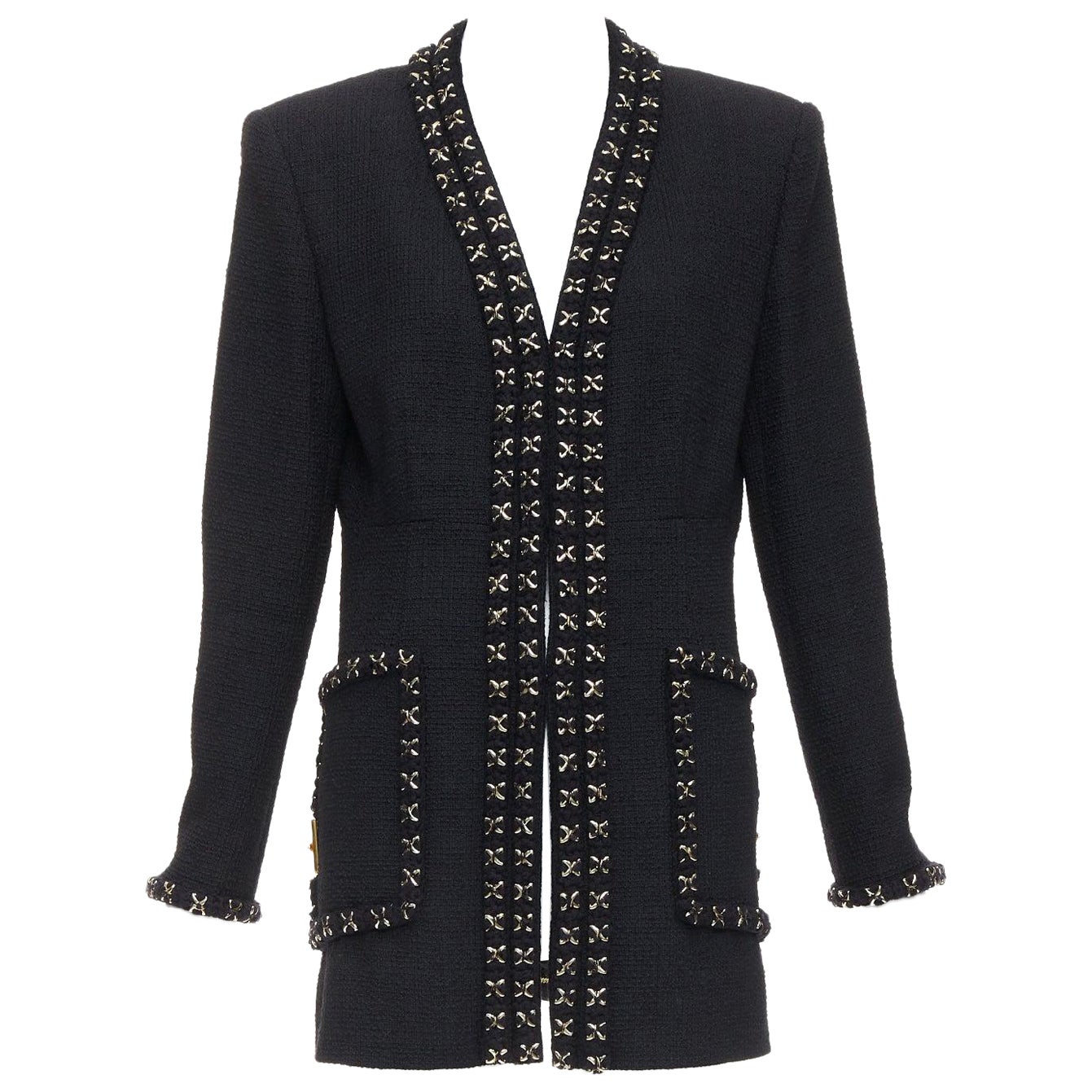 CHANEL 17A cappotto lungo in tweed nero e oro con bottoni Lionheart intrecciati FR44