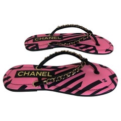 Chanel Sandalias Flip Flop rosa oscuro y negro
