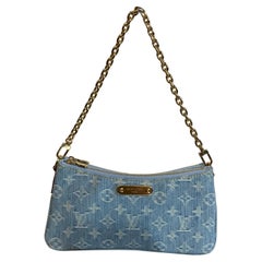 Louis Vuitton Liv Monogram Denim clutch Bag