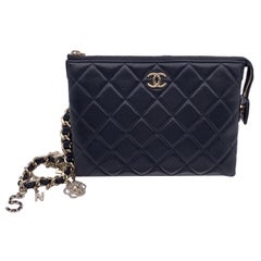 Chanel 2021 Black Quilted Leather Pouch Coco Charms Clutch Bag