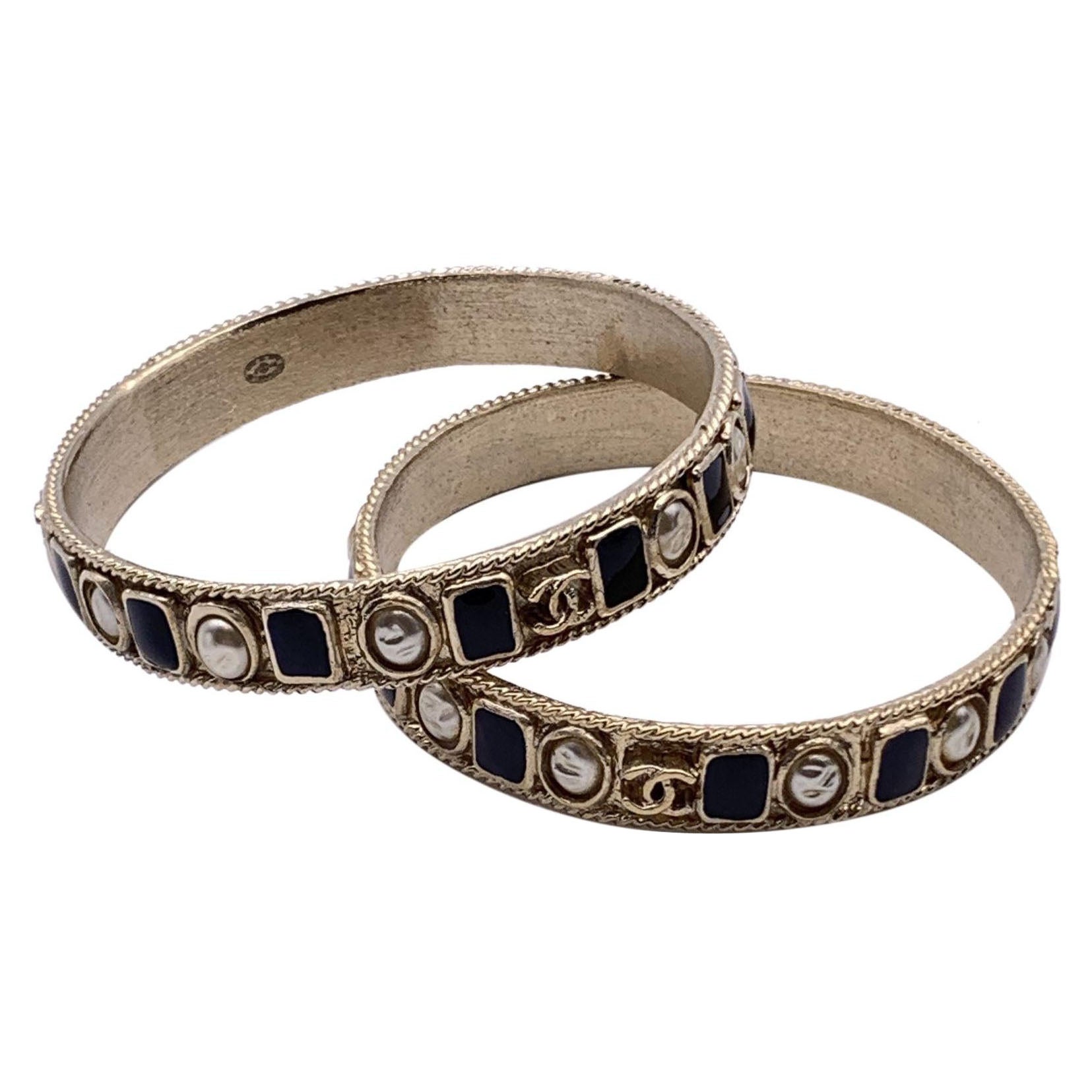 Chanel Set of 2 Gold Metal Black Enamel Pearls Cuff Bangle Bracelets For Sale