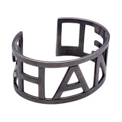 Chanel Silver Metal Logo Letter Cuff Bangle Bracelet