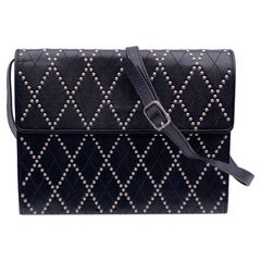 Yves Saint Laurent Vintage Schwarze umwandelbare Umhängetasche mit Nieten