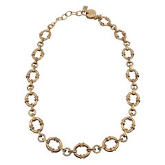 Yves Saint Laurent Collana con anelli a catena in metallo dorato vintage