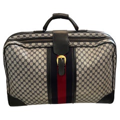 Un'iconica borsa da viaggio in tela Monogram vintage di Gucci degli anni '80