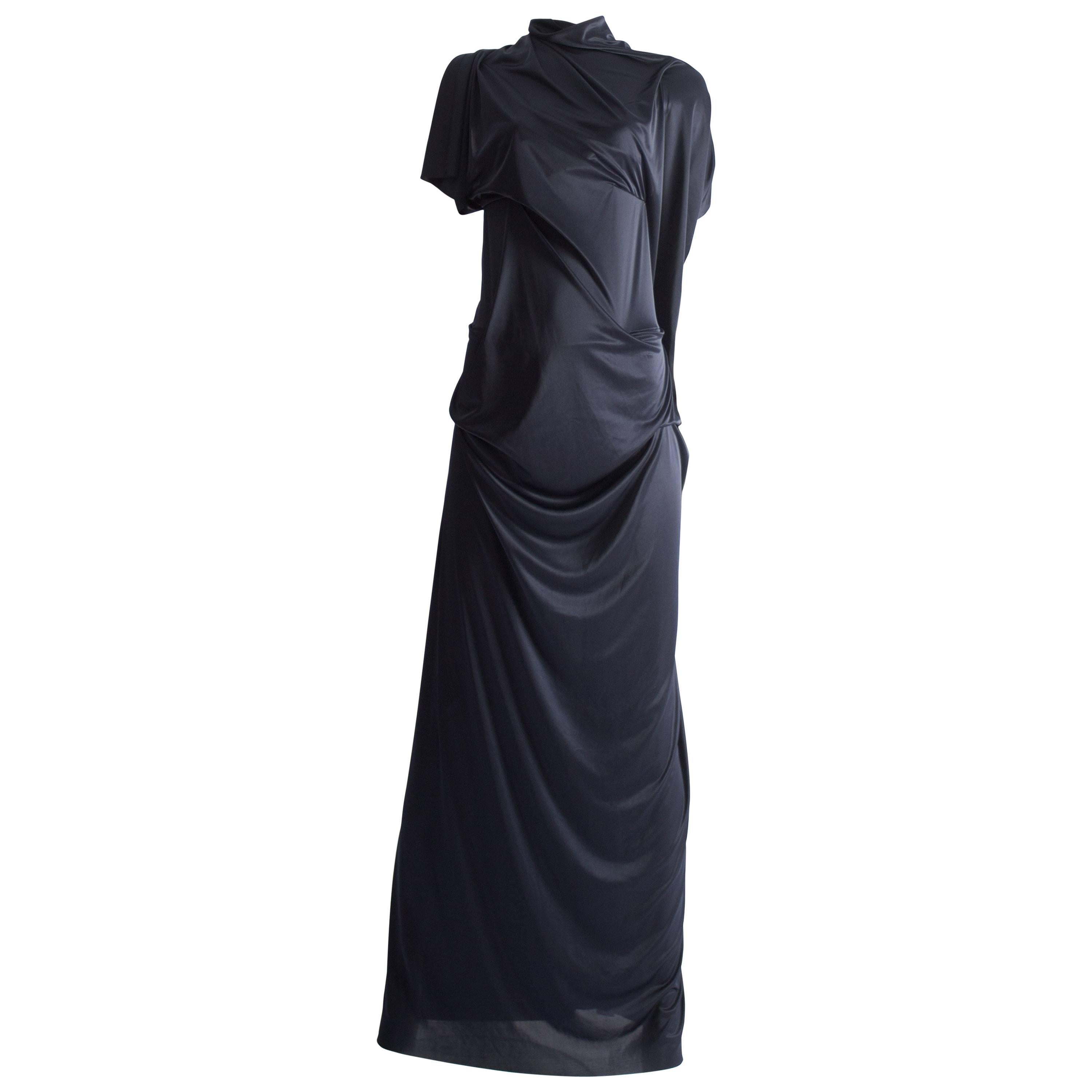 Maison Martin Margiela midnight blue evening dress, Spring-Summer 2012. 

Draped construction throughout with built in nude colored adjustable bra and underwear, high slit at the back, and adjustable neckline which can be styled as a halter-neck or