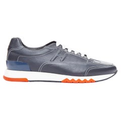 HERMES Trail navy calf leather orange accent colorblock sneakers EU41