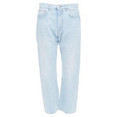 TOTEME Twisted Seam jean asymétrique bleu clair lavé 27 po.
