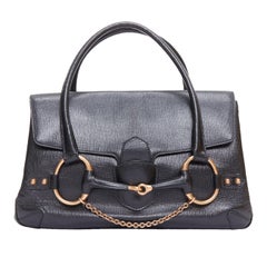 GUCCI Vintage Tasche aus schwarzem Leder mit goldener Horsebit-Kette