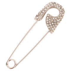 Broche imperdible Dior con brillantes de Swarovski, años 90