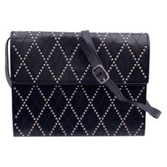 Yves Saint Laurent Borsa a tracolla convertibile con borchie nera vintage