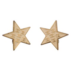 Orecchini a clip Chanel Vintage in metallo dorato Beige Stelle CC Loghi