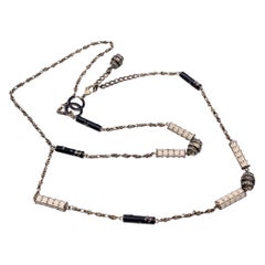 Collana o cintura Chanel in metallo dorato Paris Shangai CC Cylinders